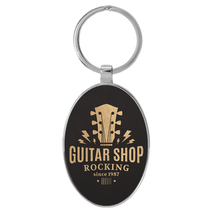 Black/Gold 3" x 1 3/4" Laserable Leatherette/Metal Oval Keychain