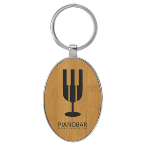 Bamboo 3" x 1 3/4" Laserable Leatherette/Metal Oval Keychain
