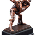 10 INCH ANTIQUE BRONZE ELECTROPLATED WRESTLER TROPHY ON BLACK WOOD BASE