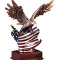 10 INCH ELECTROPLATED BRONZE ATTACKING EAGLE WITH PAINTED AMERICAN FLAG TROPHY ON WALNUT FINISH BASE