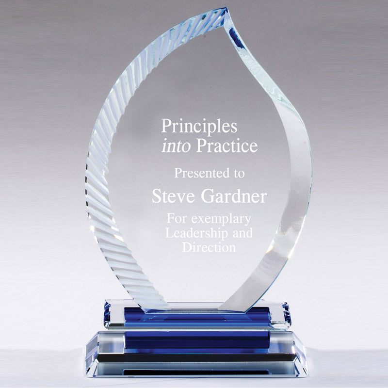 7 X 4-1/2 INCH OPTICAL CRYSTAL FLAME AWARD WITH SERRATED EDGE BLUE BASE.
