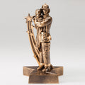 8-3/4 INCH RESIN FIREMAN WITH CHILD IN ANTIQUE GOLD FINISH