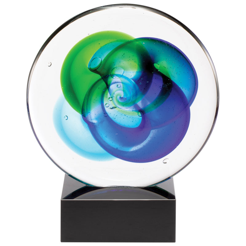 8 INCH ROUND HAND BLOWN BLUE AND GREEN GLASS AWARD WITH SWIRL PATTERN ON A BLACK CRYSTAL BASE