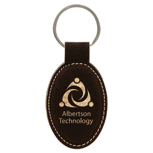 Black/Gold 3" x 1 3/4" Laserable Leatherette Oval Keychain