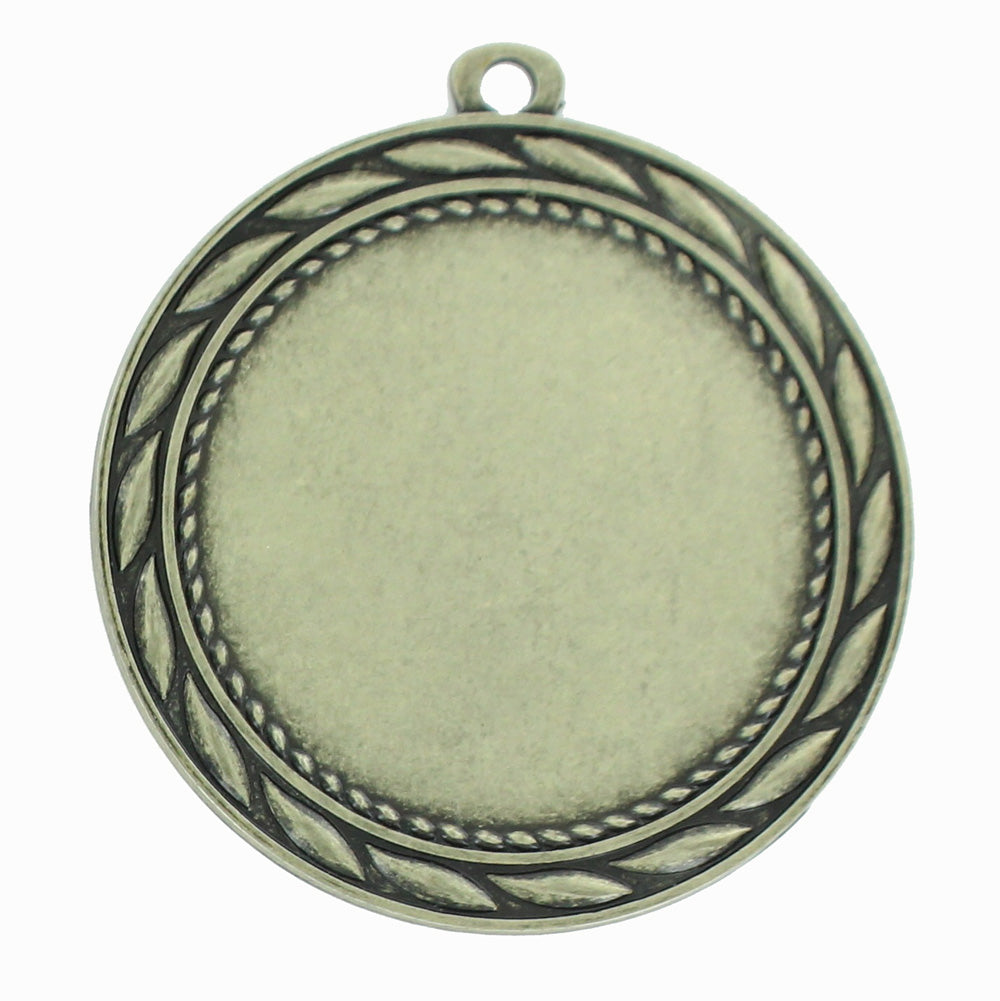 MEDAL FRAME WITH WREATH, HOLDS 2 INCH MEDALLION INSERT. ANTIQUE BRASS 2-3/4 INCH DIAMETER